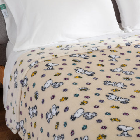 Berkshire Blanket Snoopy close detail of Woodstock print with bright colors