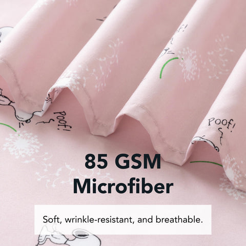 Berkshire Blanket Snoopy fabric texture macro revealing smooth microfiber for cozy comfort