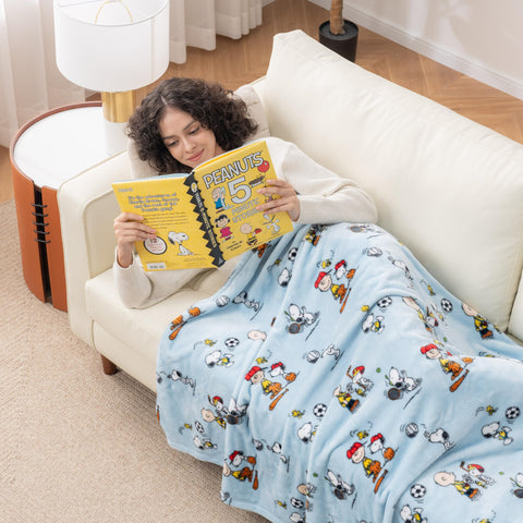 Berkshire Blanket Snoopy folded with label shows neat storage and brand guarantee