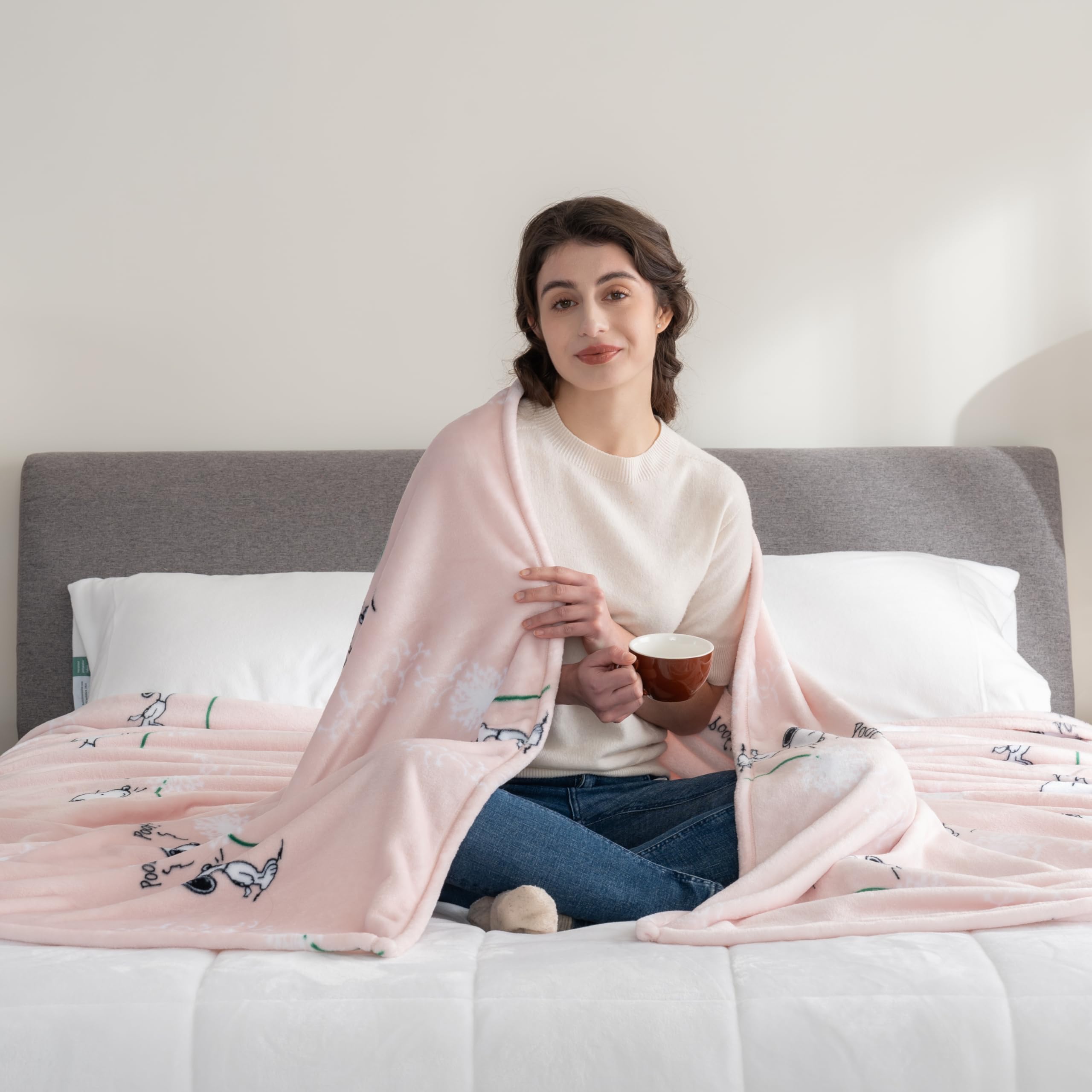 Berkshire Blanket fully spread displaying Snoopy design and generous king size