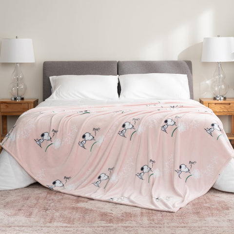 Berkshire Blanket styled on bed with Snoopy print adding playful bedroom comfort