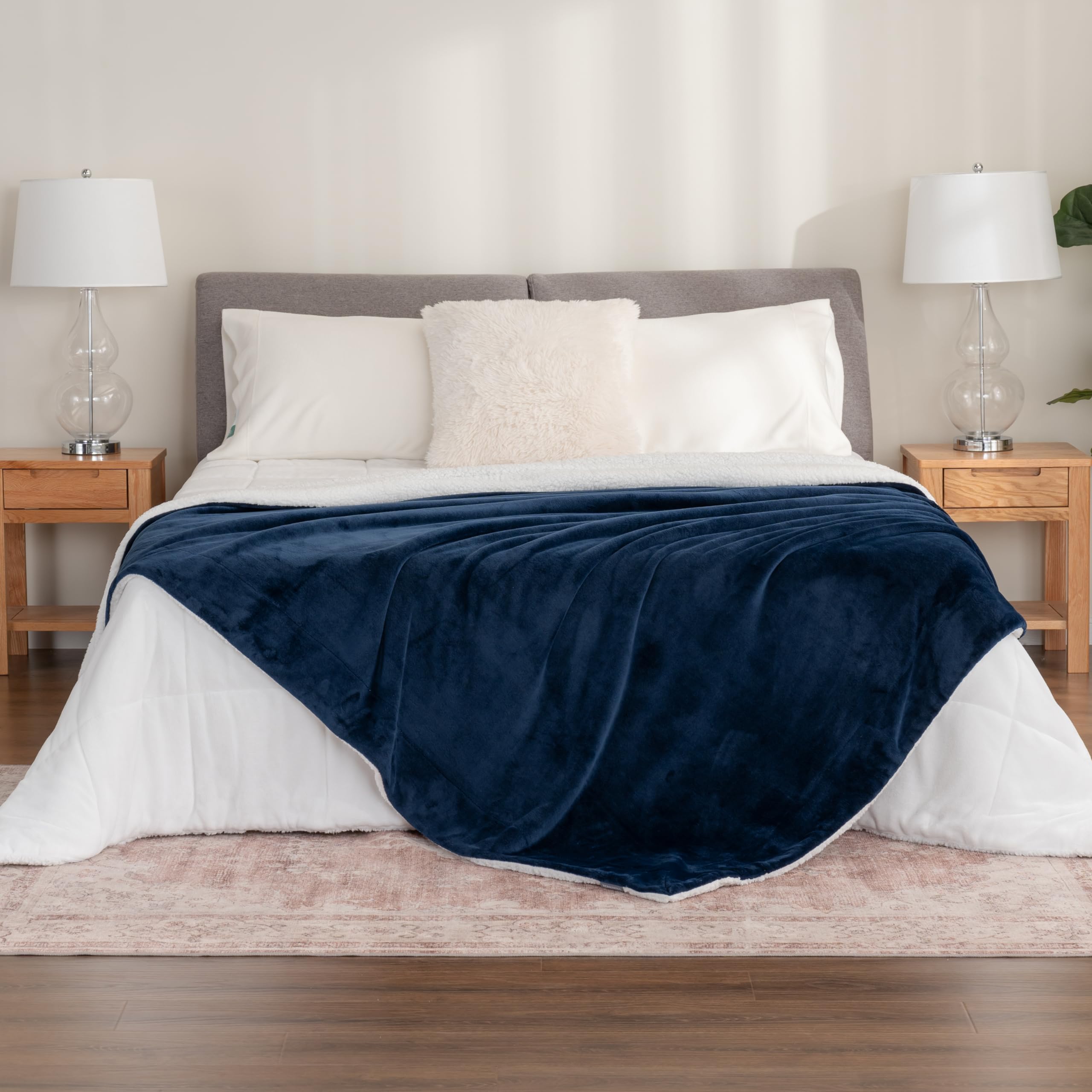 Berkshire Blanket draped over sofa showing cozy living room layering