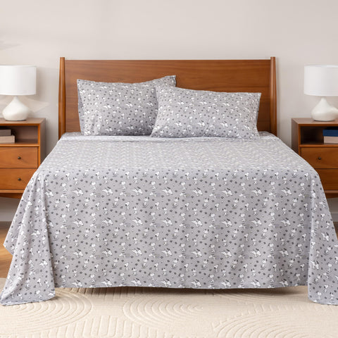 Berkshire Blanket fitted sheet close-up showing snug elastic fit benefit: stays secure on mattress