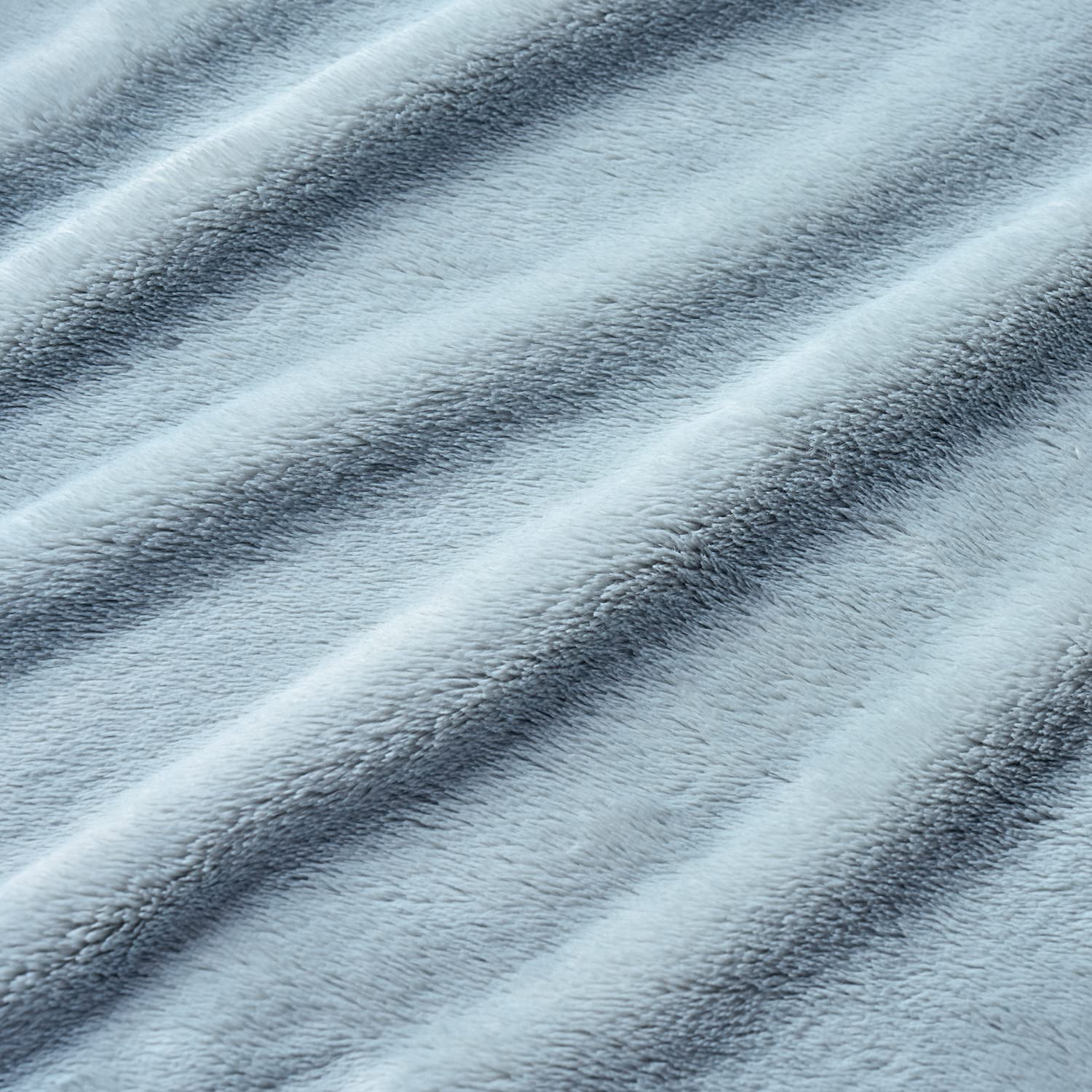 Berkshire Blanket folded compact for travel showing portability and convenience