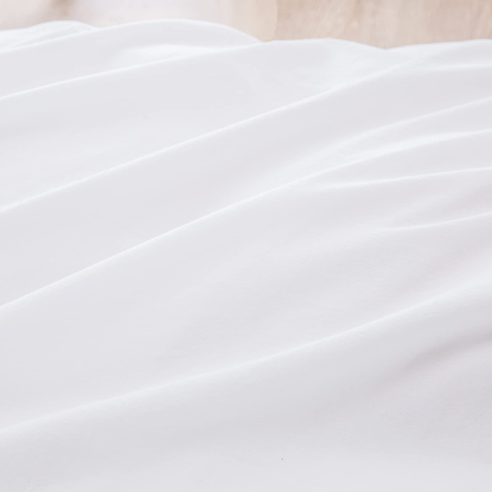 BESTOUCH styled queen bed with duvet cover showing elegant versatile bedroom appeal