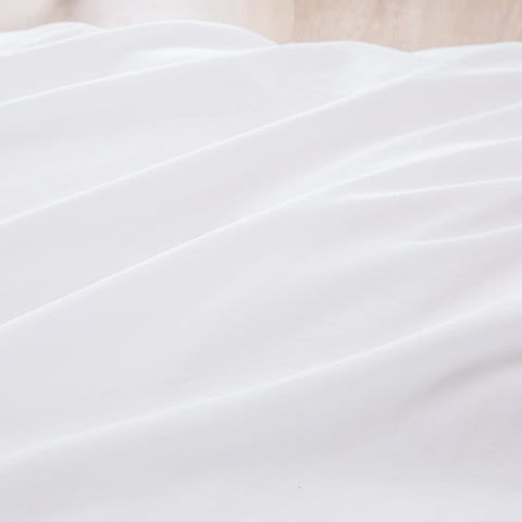 BESTOUCH styled queen bed with duvet cover showing elegant versatile bedroom appeal