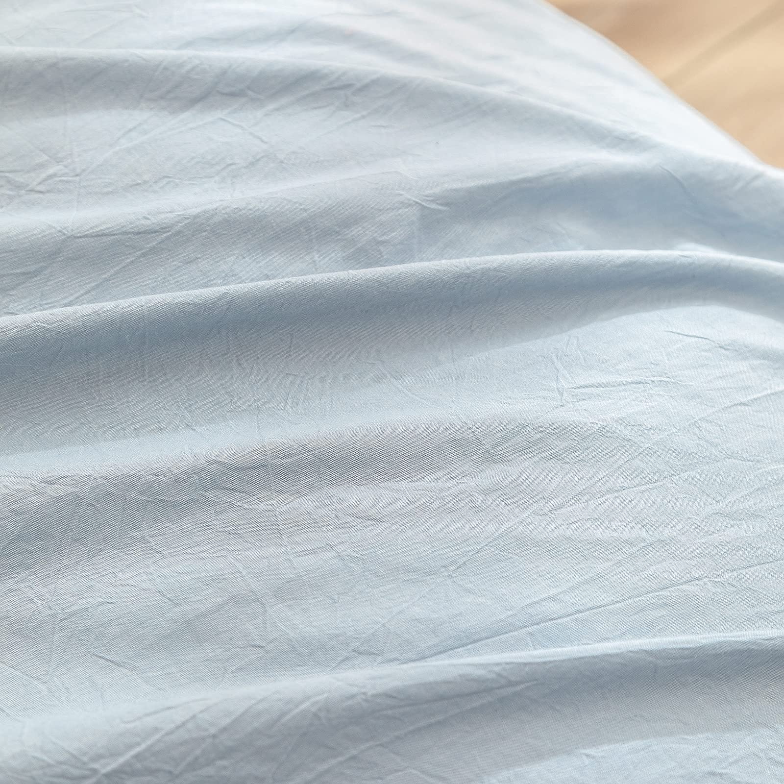 BESTOUCH duvet cover on king bed showing scale and generous drape for full coverage