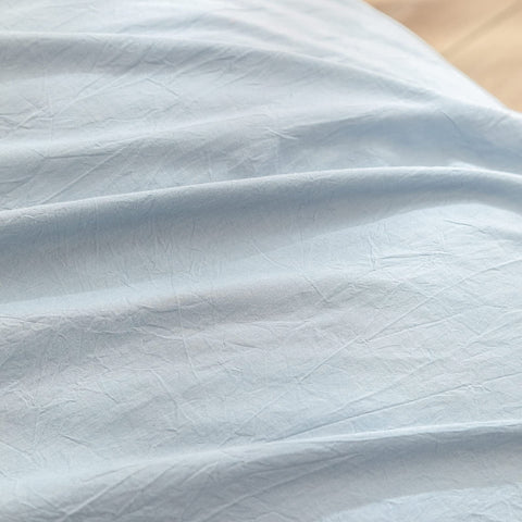 BESTOUCH duvet cover on king bed showing scale and generous drape for full coverage