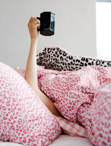 Betsey Johnson pink leopard print close-up showing soft microfiber texture