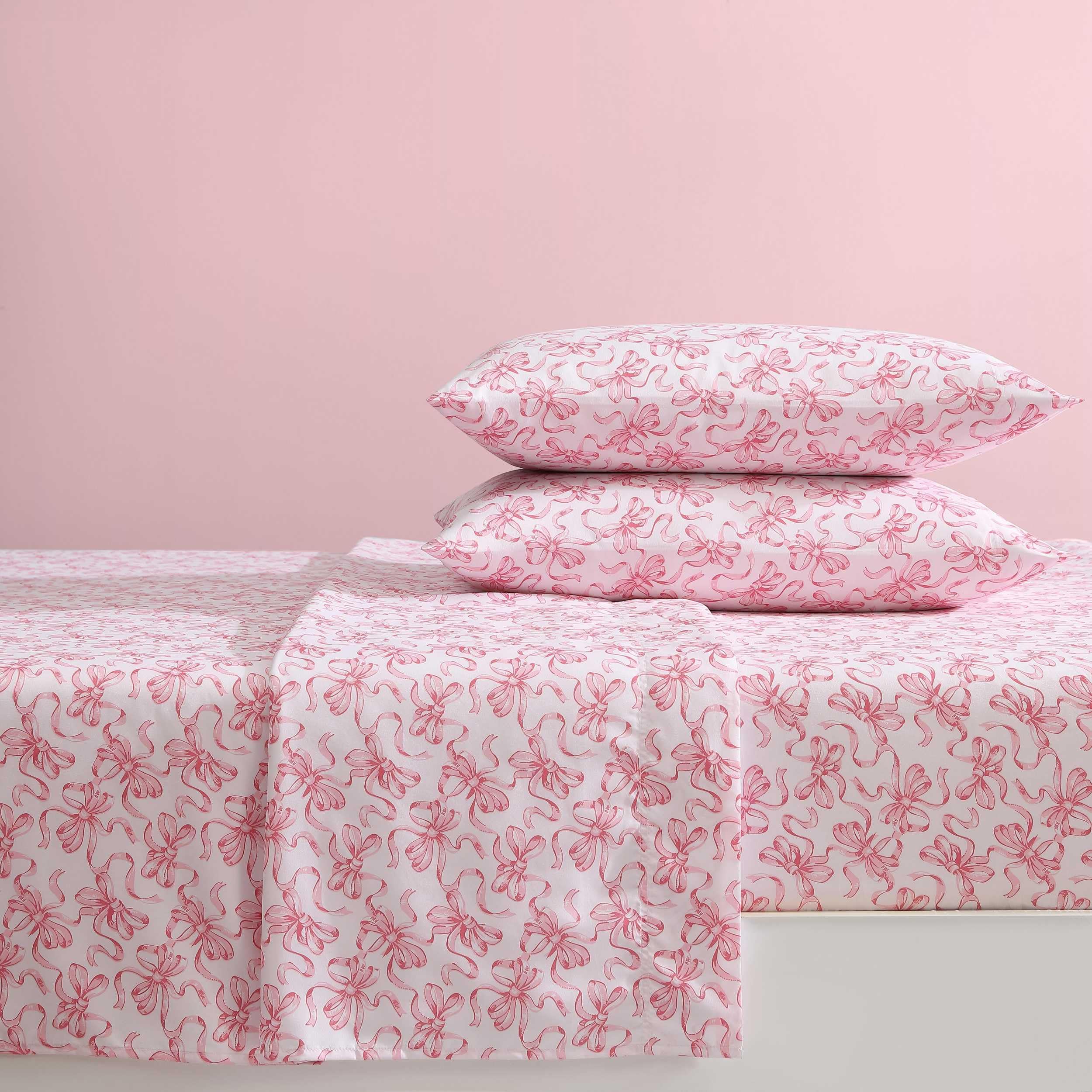 Betsey Johnson mattress demo comparing sheet pocket depth showing compatibility benefit