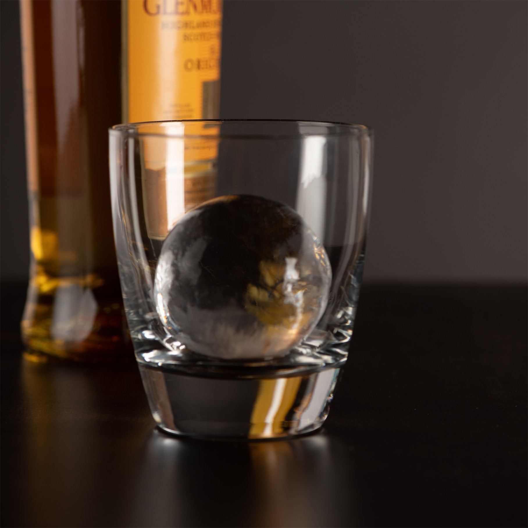 Better Kitchen Products ice sphere in whiskey glass demonstrating slow-melt benefit
