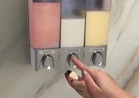Better Living dispenser next to common toiletry items to show compact size and space-saving benefit