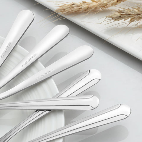 BEWOS forks arranged in dishwasher demonstrating convenient cleanup
