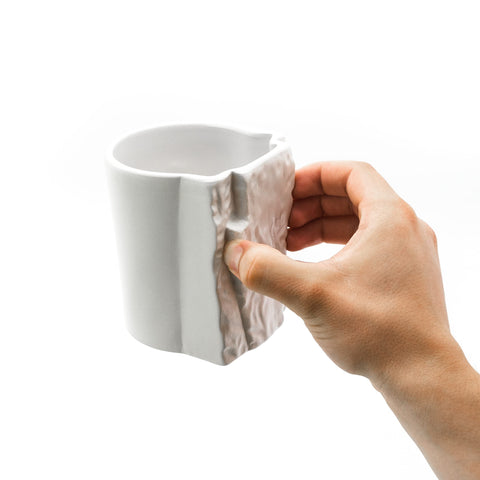 BG Climbing front view of mug showing crimp-inspired rim for grip practice