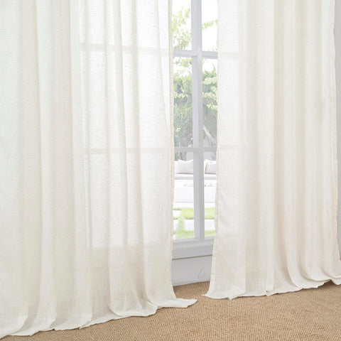 BGment curtains next to a standard window showing scale and full coverage benefit