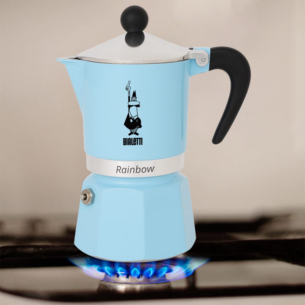 Bialetti Rainbow in a kitchen scene pouring espresso, showing convenience and colorful style