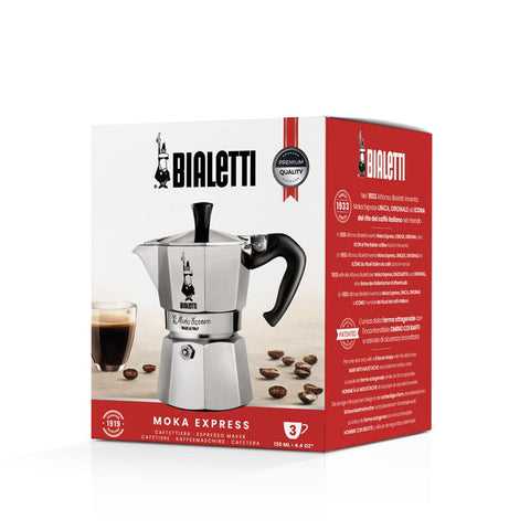 Bialetti next to espresso cup for scale showing compact 130 ml capacity