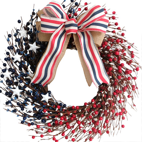 Bibelot front view wreath showing red white blue berries and burlap bow for curb appeal