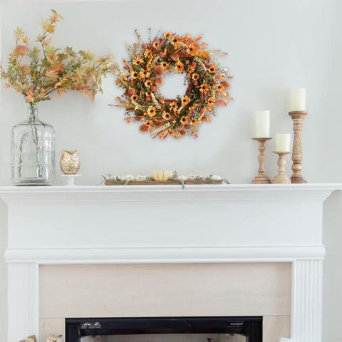 Bibelot wreath displayed next to door frame showing 22 inch scale