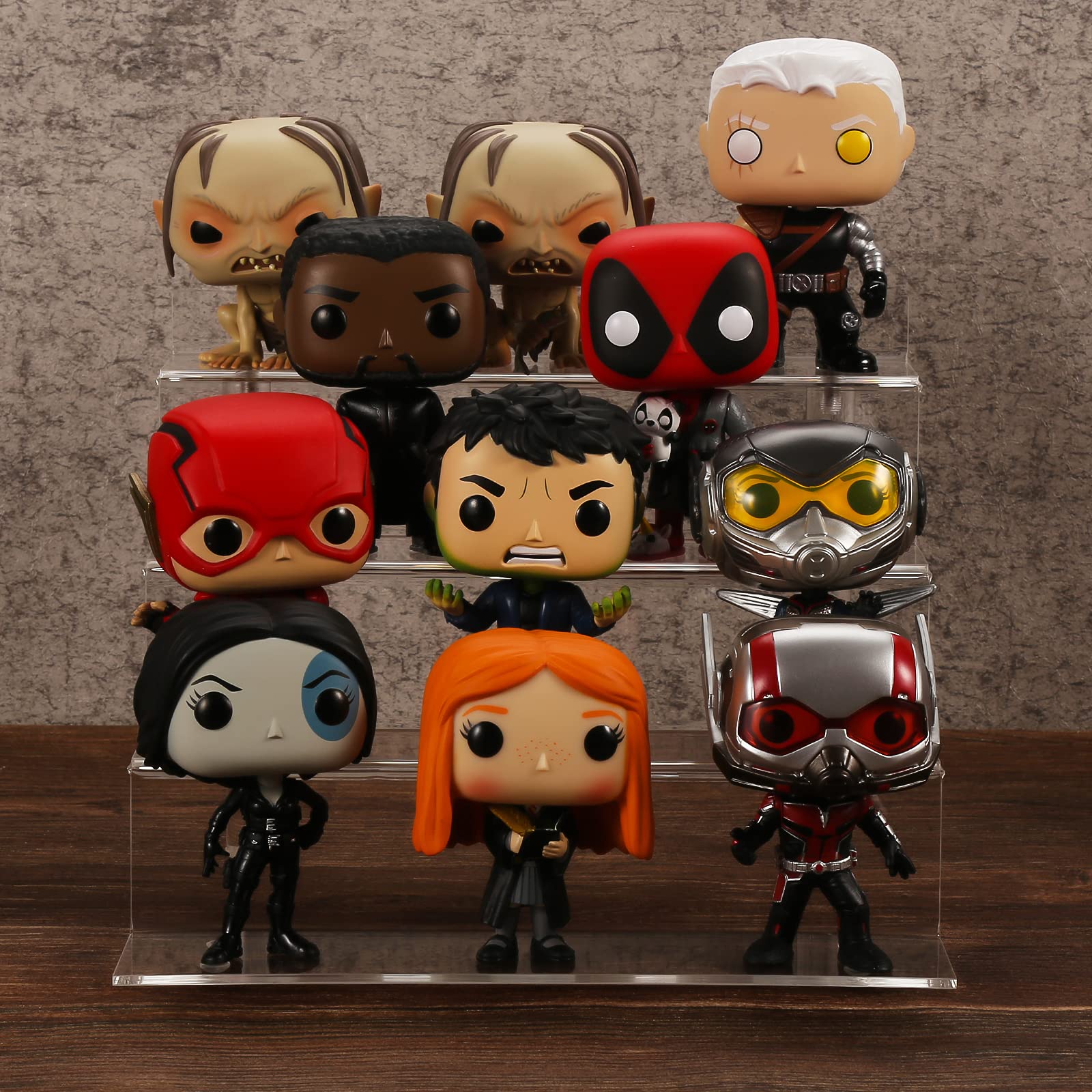 bigantss acrylic riser used on a dessert table to elevate cupcakes and improve display appeal