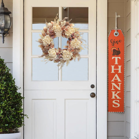 BINFEN wreath beside door for scale showing true 18 inch size