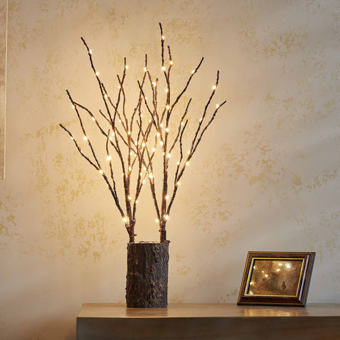 Birchlitland evening mantel scene illustrating cozy warm-white illumination