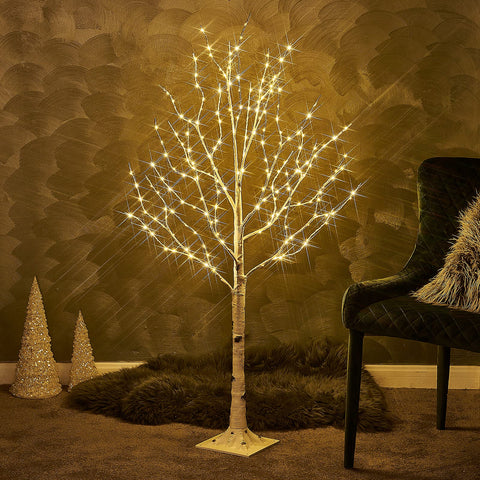 Birchlitland front view warm white tree creating cozy glow