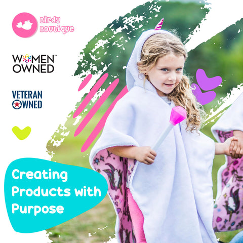 birdyboutique parent pushing stroller with poncho for on-the-go warmth