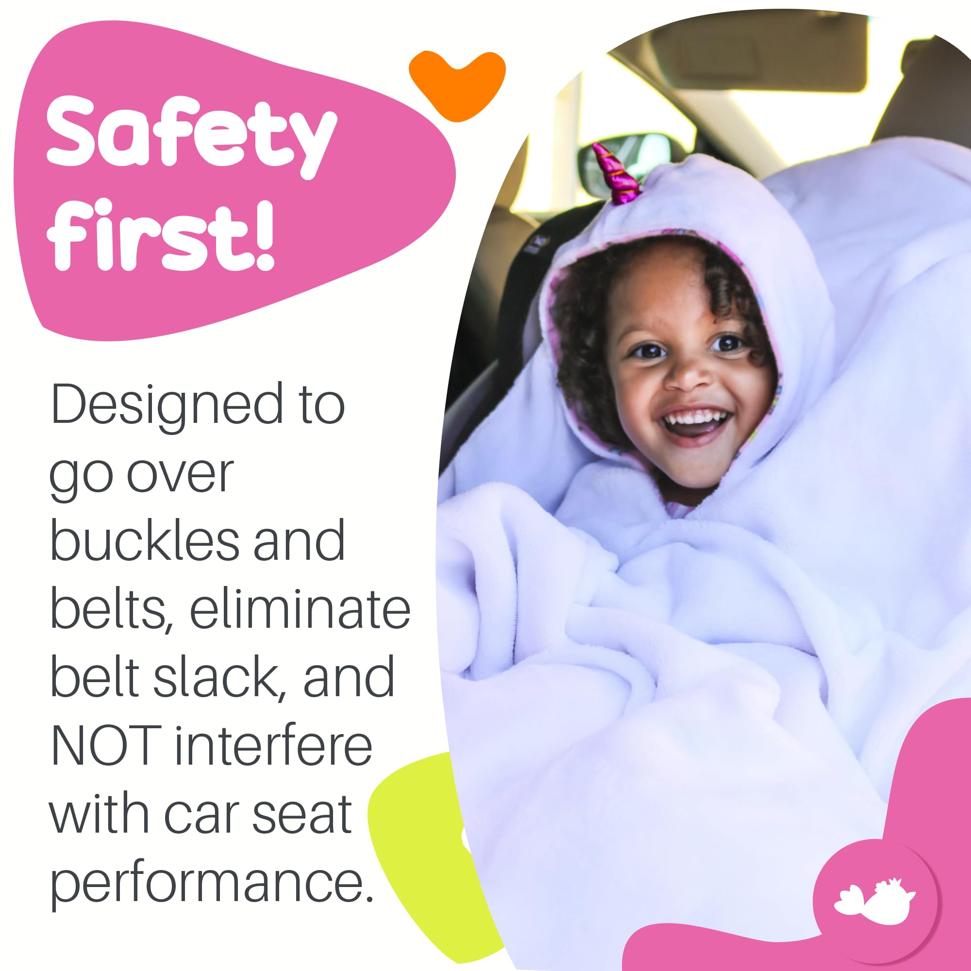 birdyboutique child wearing poncho in car seat showing safe harness fit