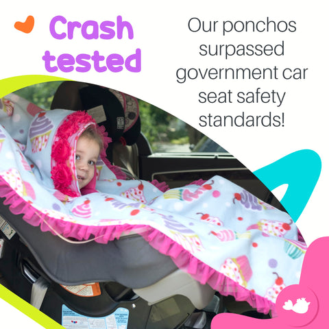Birdy Boutique poncho used in stroller illustrating multi-use convenience outdoors