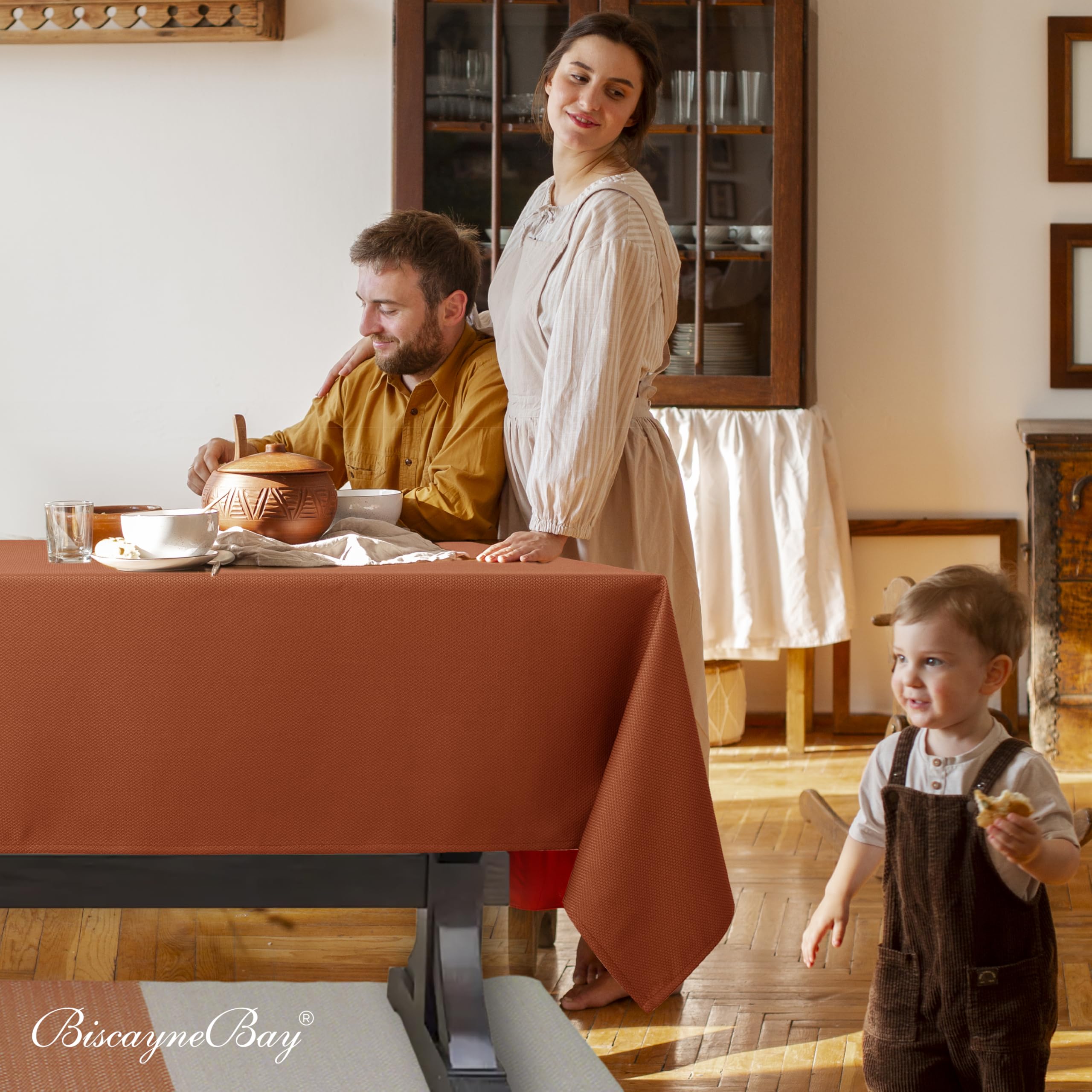 Biscaynebay styled Thanksgiving table with rust cloth enhancing autumn ambiance