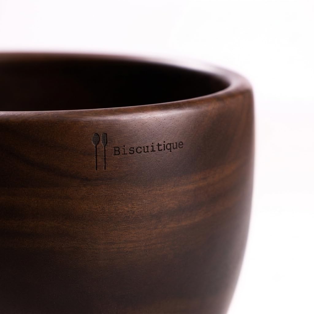 Biscuitique walnut close grain detail highlighting natural wood pattern and durable finish benefit