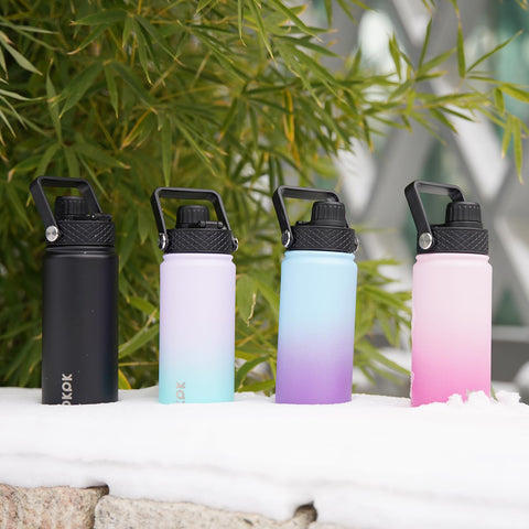 BJPKPK bottle held in hand to show 22oz size and portable convenience