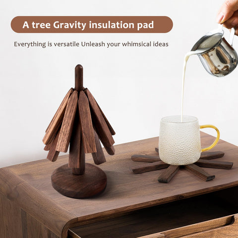 black walnut trivets held in hand to show scale and lightweight portability