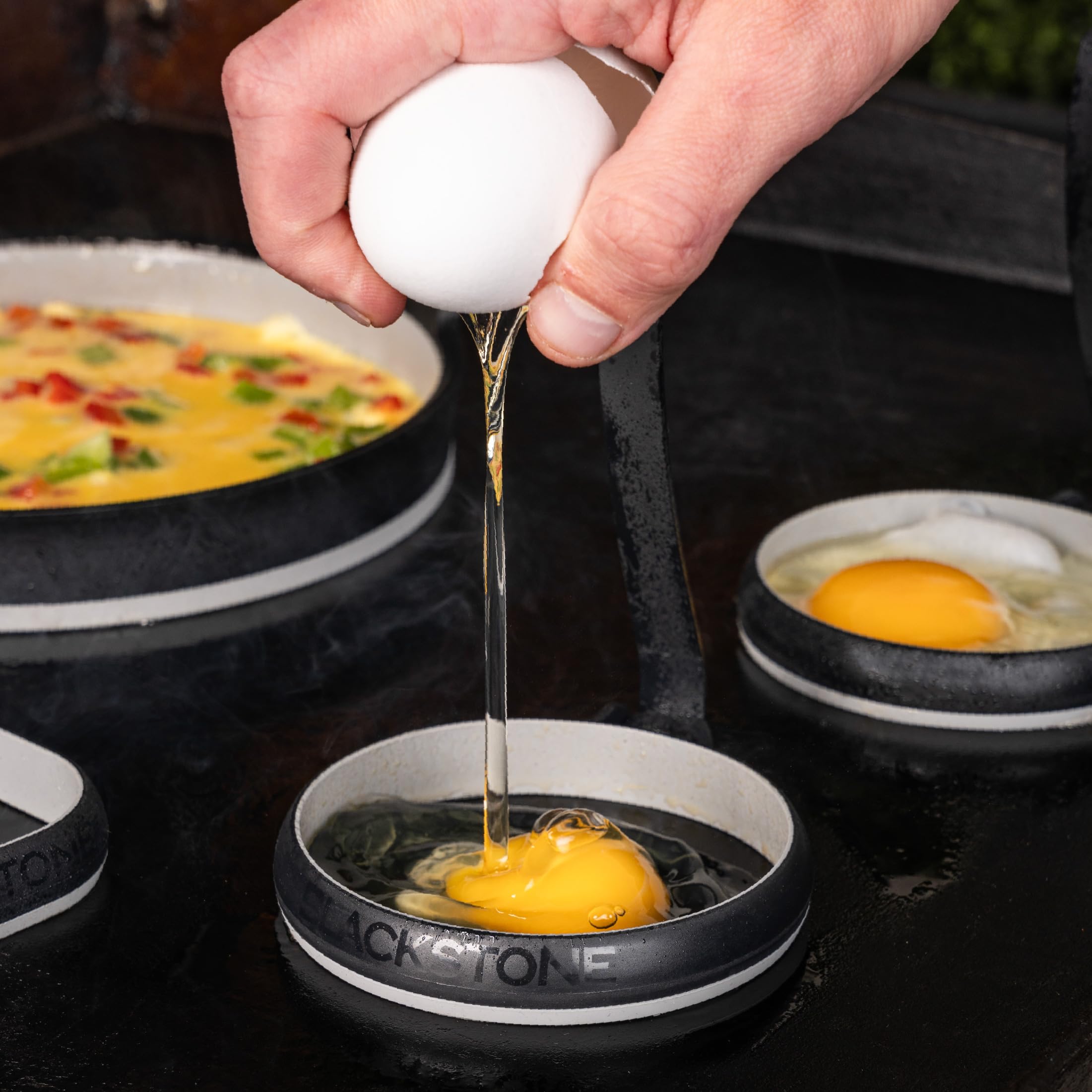 Blackstone-made breakfast sandwich using the ring for uniform, cafe-style presentation
