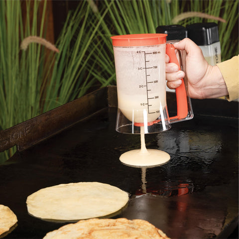 Blackstone cast iron griddle press detail showing patterned base for better sear