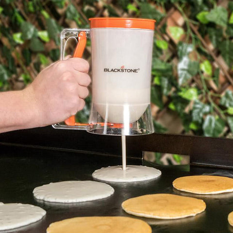 Blackstone kit with pancakes, eggs and bacon showing outdoor cooking appeal
