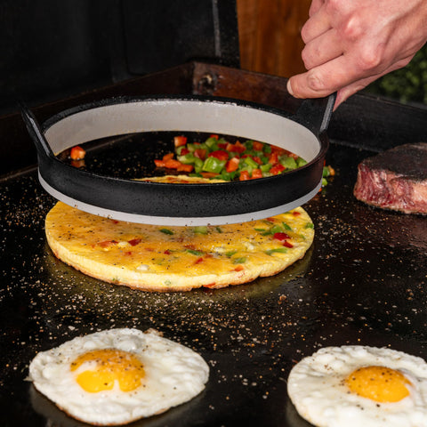Blackstone ring next to a hand to show scale and quick portion control benefit