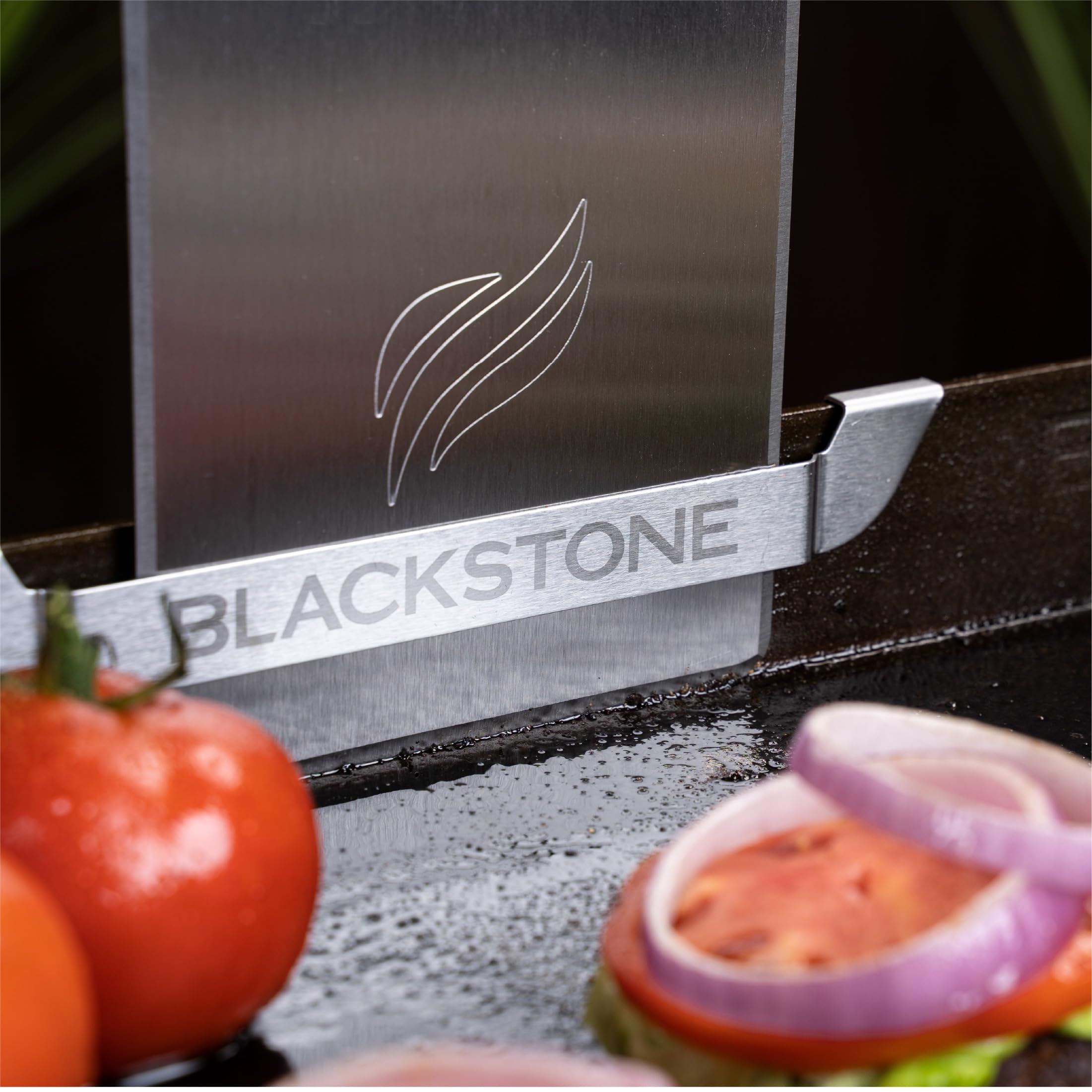 BLACKSTONE grease gate beside spatula showing scale for simple compatibility check