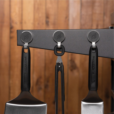 BLACKSTONE tool hooks supporting spatula and tongs to keep tools off counters and sanitary