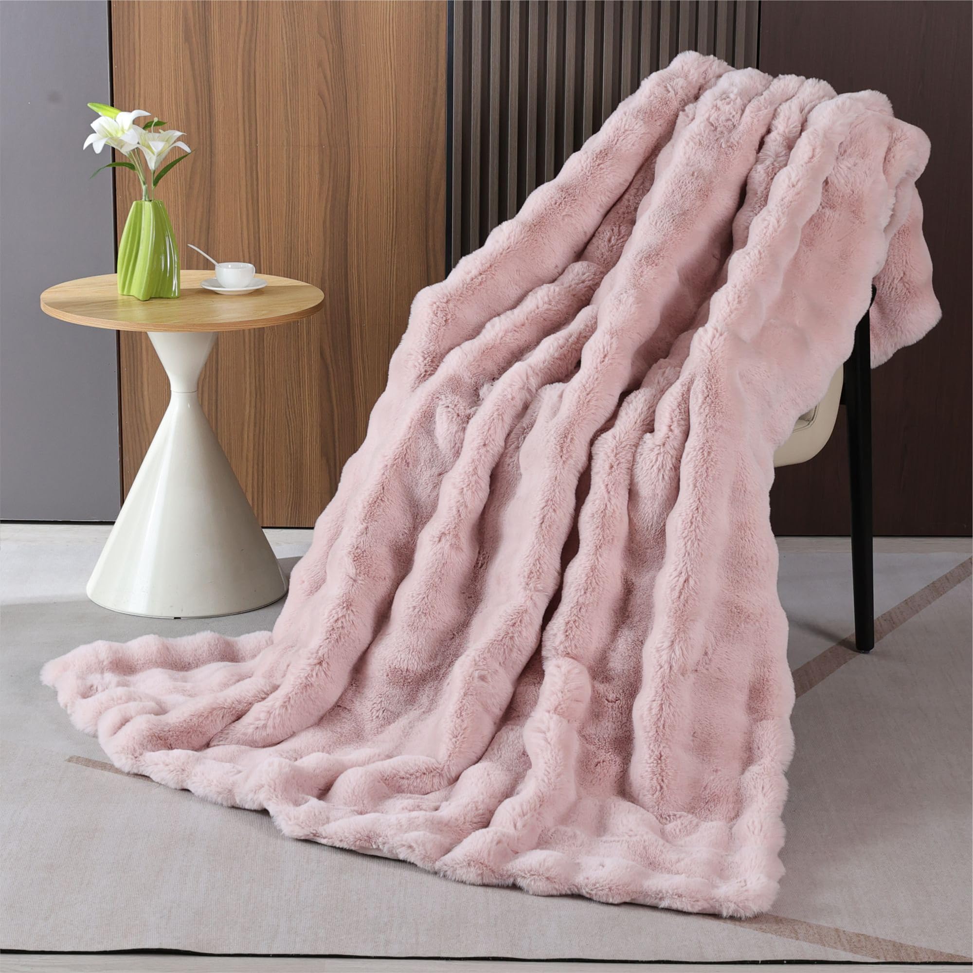 BlanketSolution draped over bed showing size and stylish bedroom warmth