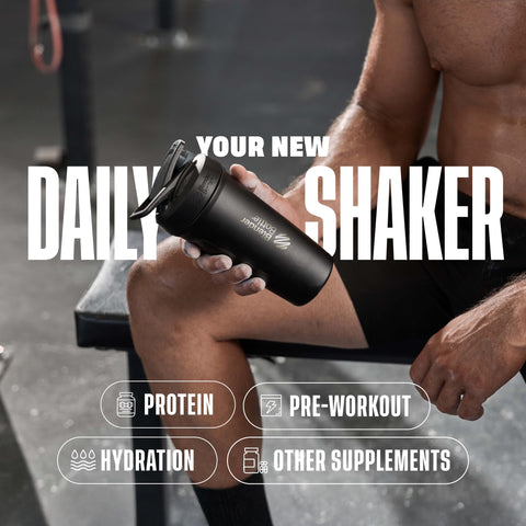 BlenderBottle on gym bench beside weights illustrating portable cold drink convenience