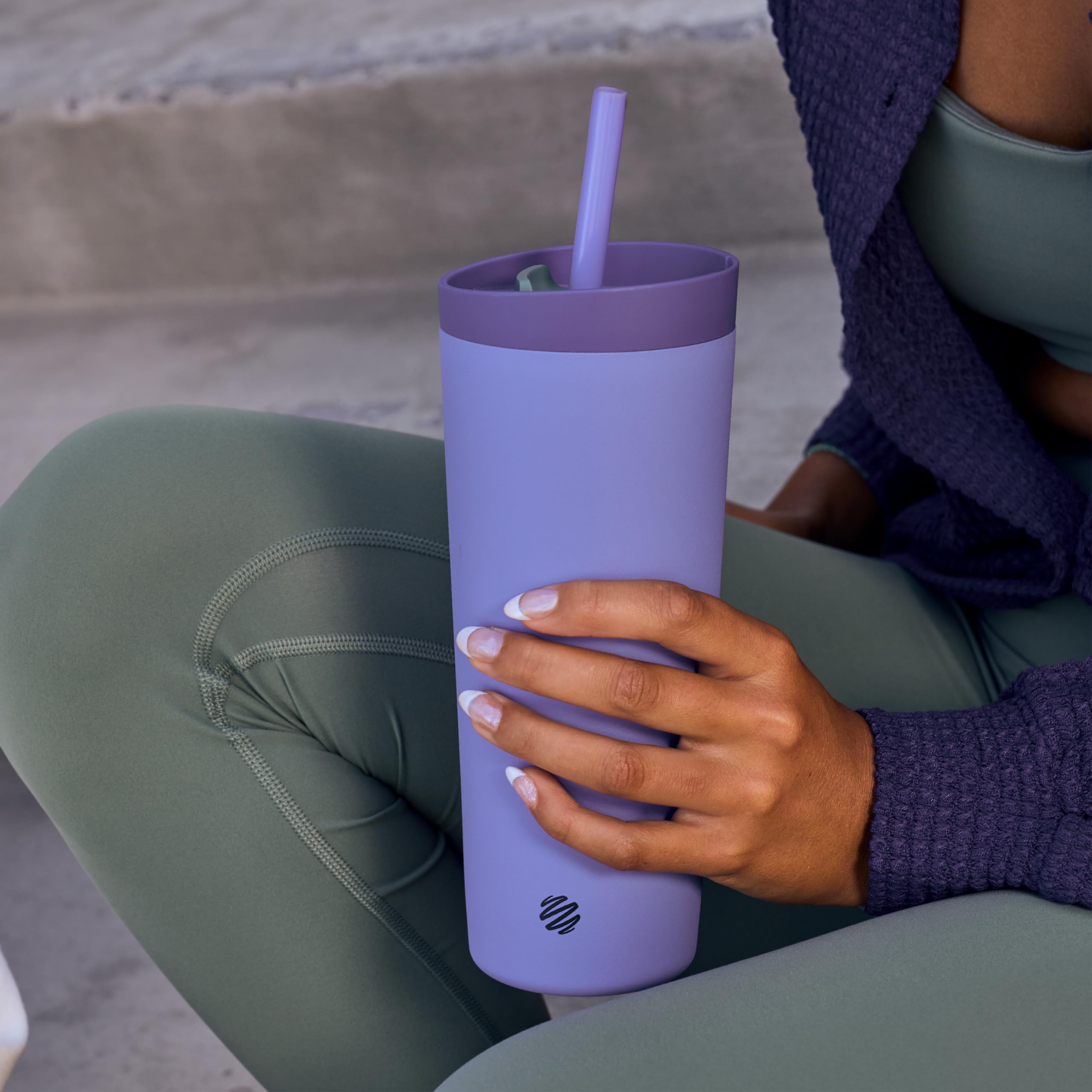 BlenderBottle in gym bag and on bench showing durable insulated tumbler for workouts