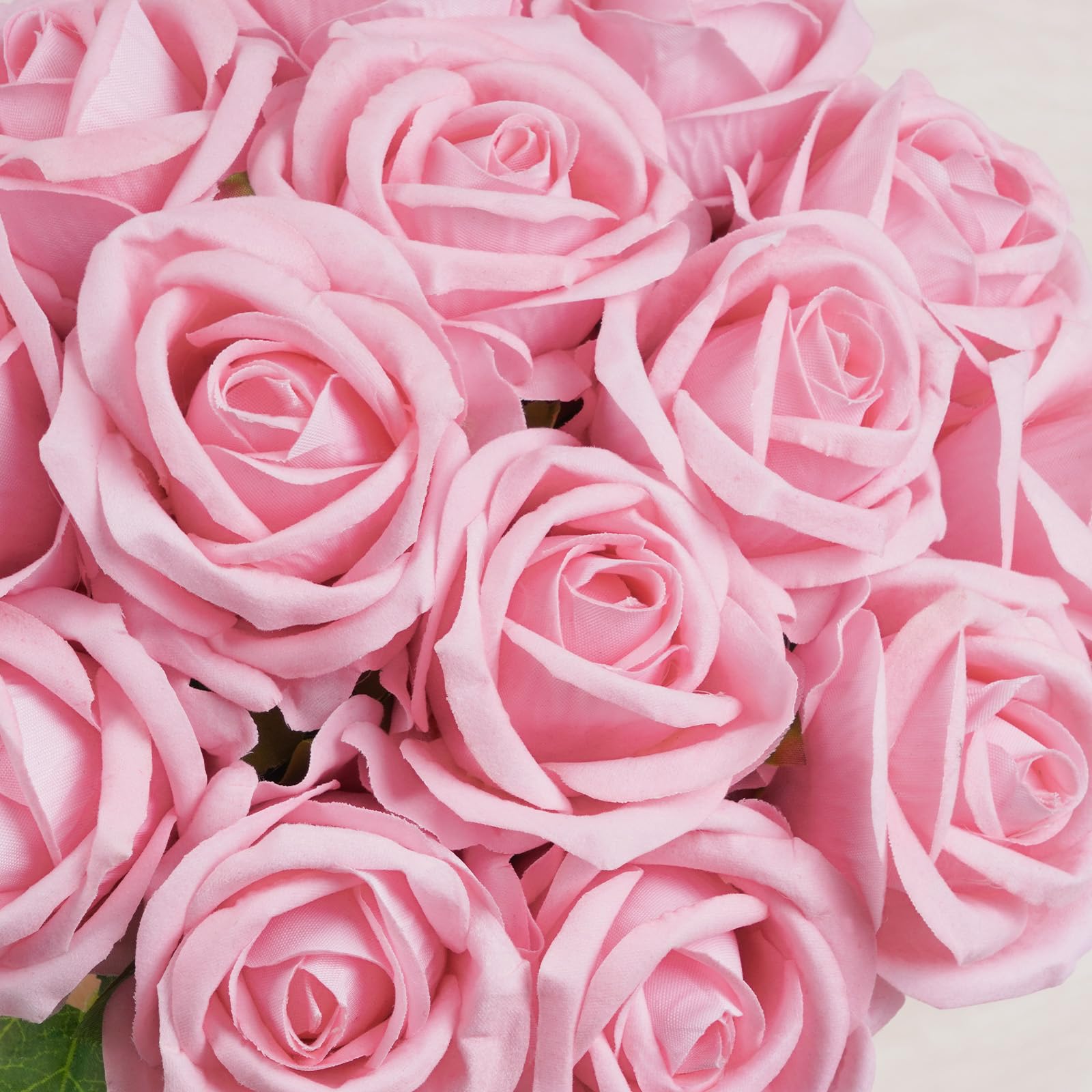 BLEUM CADE roses displayed in a vase adding long-lasting color to room