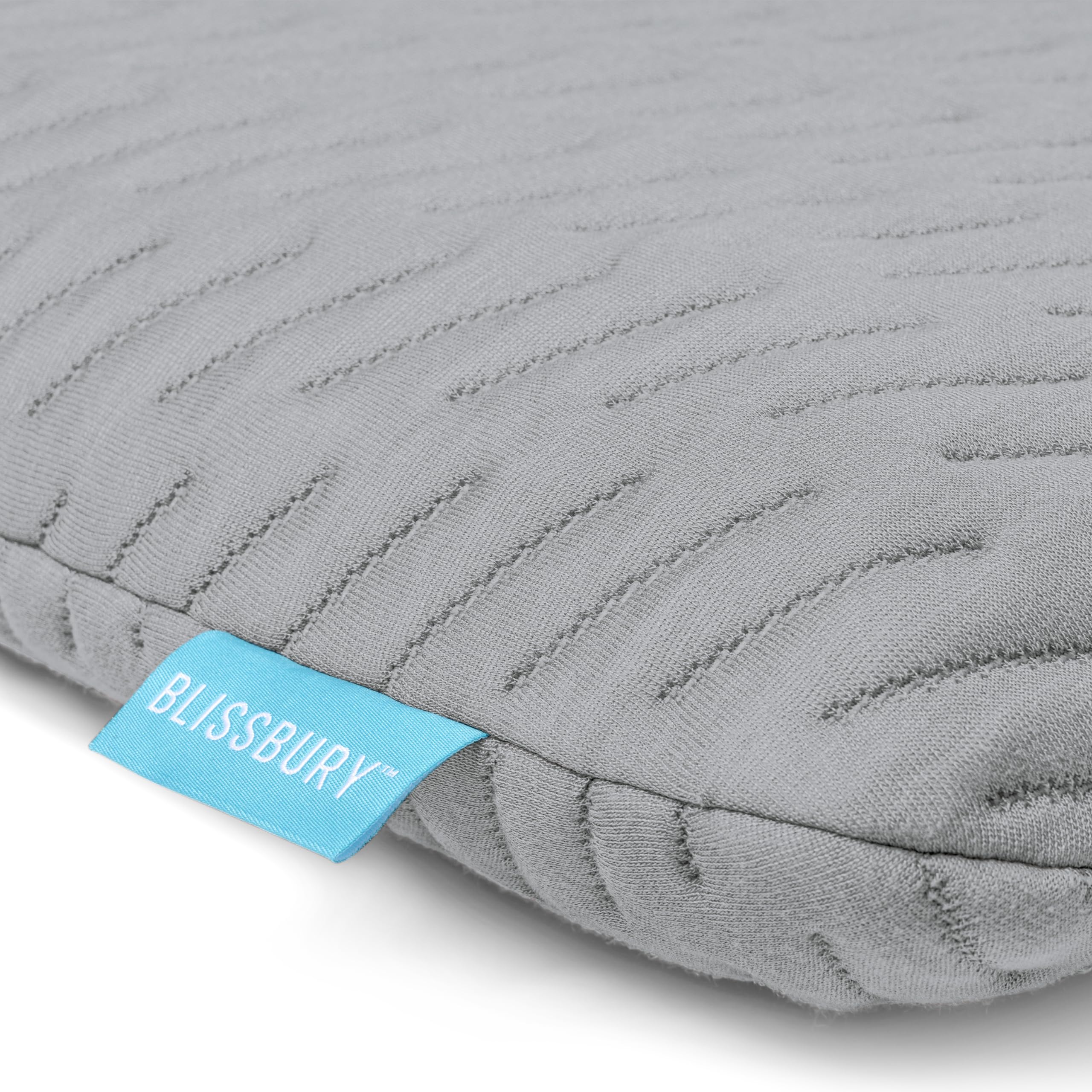 BLISSBURY pillow styled in bedroom to show neutral color match