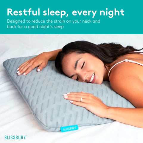 BLISSBURY pillow beside mattress to show scale and low loft