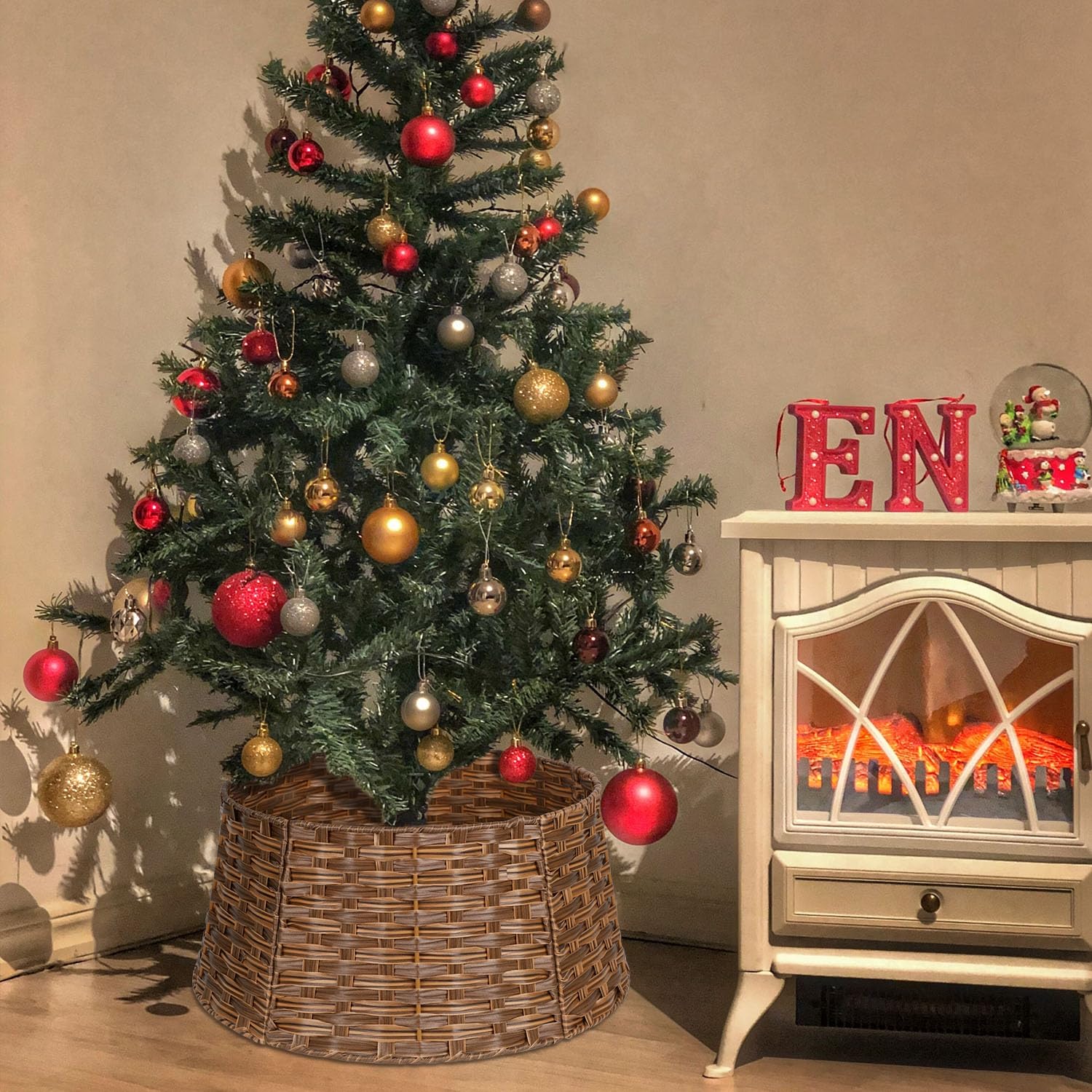 Blissun tree collar in use around decorated artificial Christmas tree for polished look