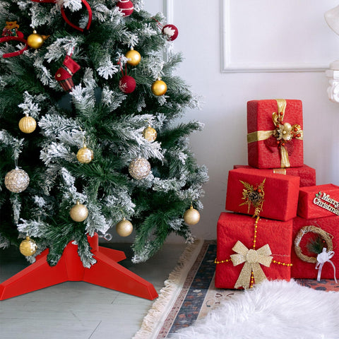Blissun stand holding a decorated tree in a living room setting benefit