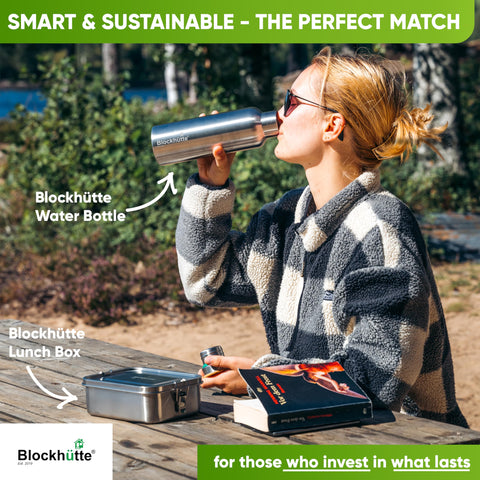 Blockhütte next to a standard bottle for clear size comparison and 1L capacity