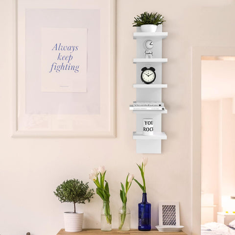 Bloddream shelf next to a book for scale showing compact size and space savings